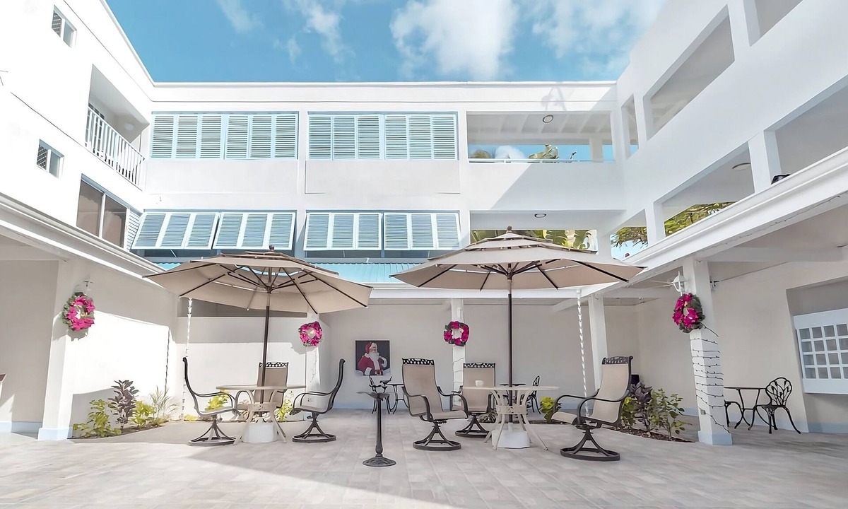 Dover Hotel | Enjoy Great Games and Events at Garrison Savannah! FREE Parking, Outdoor Pool!