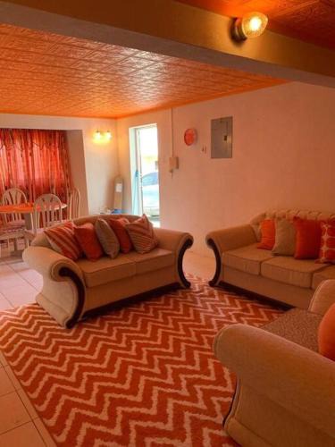 Gibbons Apartment | Lovely 2 bedroom condo with WiFi in a quiet area, 7-10 minutes away from both the airport and Oistins