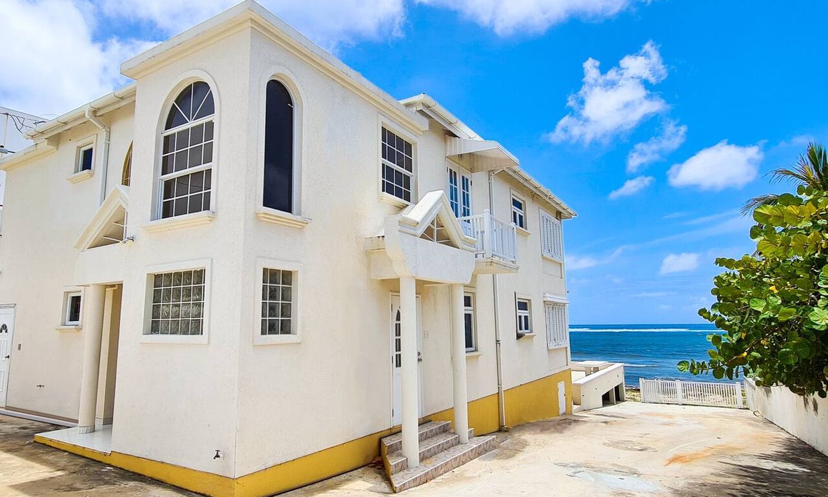 Silver Sands Apartment | Silver Sands Beachfront Condo, Indoor & Outdoor Dining, Shared Patio - Bar & BBQ
