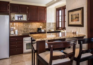 1BR/2BA Suite - Kitchen, Living Room & Balcony - Private Resort on Crane Beach!n