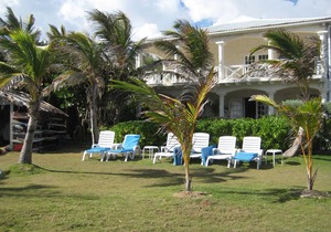 Beachfront 2 bedrooms Apt. No. 3 right one the white sand beach of Silver Sands