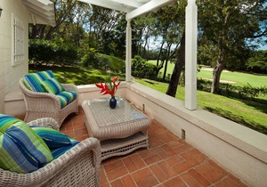 Commanding views of the verdant fairway and the Caribbean Sea beyond, is Casuarina House