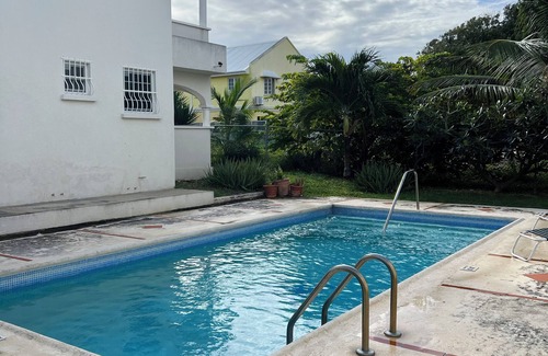 Enterprise Condo | Beautiful 2 Bed, 2 Bath Condo, Pool, W&D, & Airy Patio. Walk to Miami Beach
