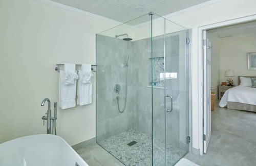 Douglas House | Capri Manor, Young Estates · Stunning Luxury Beachfront Villa