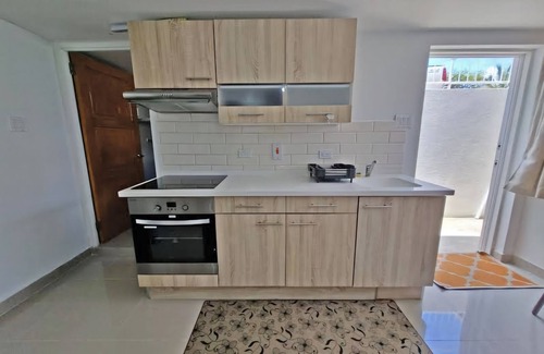Oistins Apartment | Charming studio in quiet, adorable location in Christ Church with WiFi, AC & TV