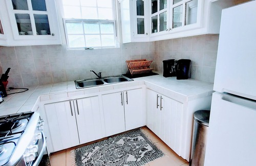 St. Lawrence Gap Apartment | Private Patio Upstairs Condo Suite at Mangoville