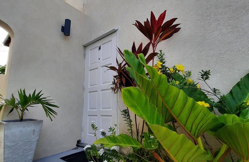 St. Lawrence Gap Apartment | Private Patio Upstairs Condo Suite at Mangoville