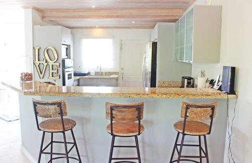Porters Villa | Stylish West Coast Villa with Beach Club Membership Tennis Court and Pool