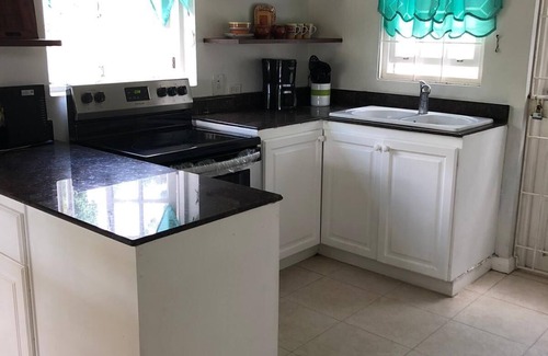 Lead Vale House | Townhouse with Communal Pool and Tennis Court in Blissful Setting.