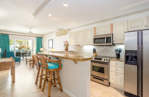 Oistins Condo | #101 Oceanview beachfront Maxwell Beach Villas