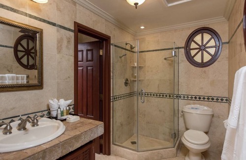 Diamond Valley Resort | 1BR/2BA Suite - Kitchen, Living Room & Balcony - Private Resort on Crane Beach!n