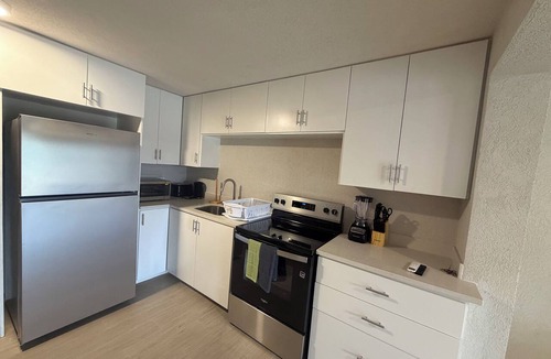 Derricks Apartment | 2 bed 1 bath apartment w/AC, WIFI, kitchen & 5 min walk to west coast beaches