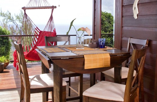 Ragged Point House | A beautiful wooden house built among the trees with views of the Atlantic coast