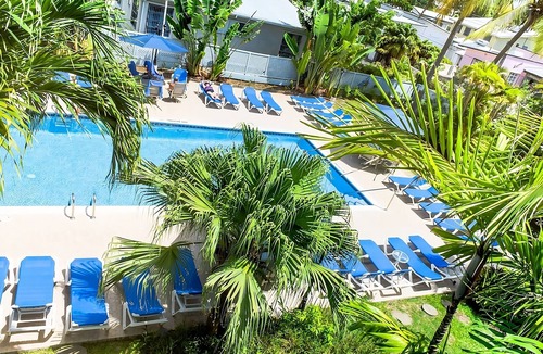 St. Lawrence Gap Apartment | A Short Drive Away from Welches Beach! 4 Pool View Rooms w/Patio! FREE Parking!