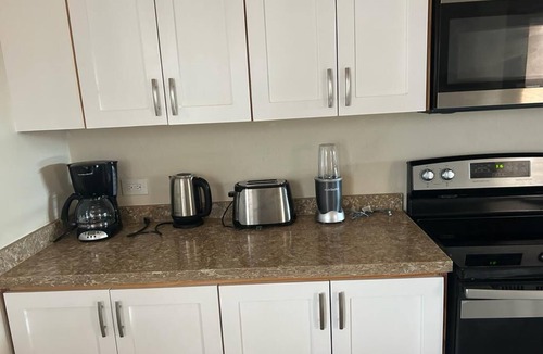 Enterprise House | Apt #1-Newly built apartments, great for families/friends, minutes walk to beach
