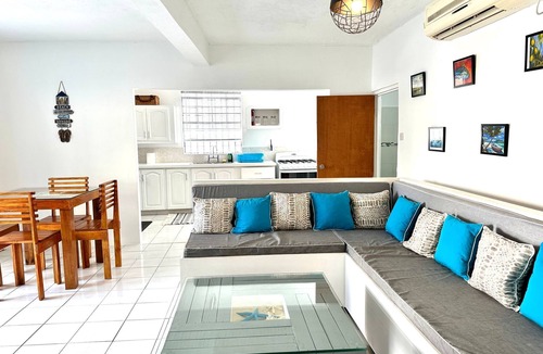 Oistins Apartment | At Ease On The Beach