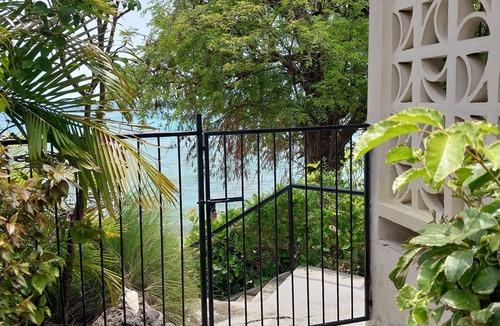 Derricks Apartment | Beachside Apartment #1 - steps from the beach!