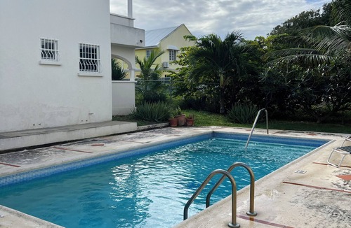 Enterprise Condo | Beautiful 2 Bed, 2 Bath Condo, Pool, W&D, & Airy Patio. Walk to Miami Beach