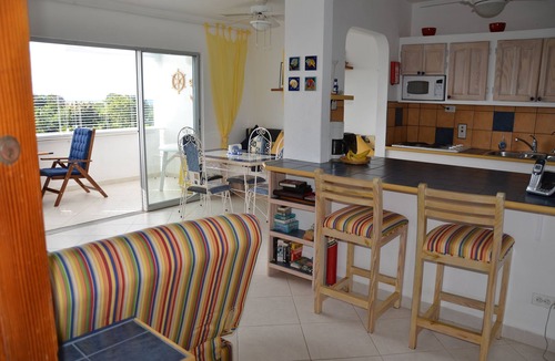 Halcyon Heights Apartment | Beautiful 4th.floor condo with pool and spectacular sunsets and ocean view