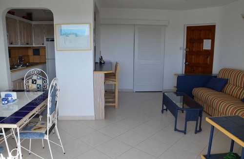Halcyon Heights Apartment | Beautiful 4th.floor condo with pool and spectacular sunsets and ocean view
