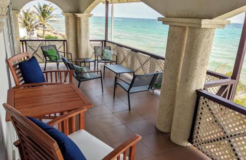 Oistins Apartment | Breezy Ocean Front Condo Close to The Best Beaches