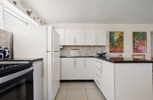Bayville Condo | Bright Interior-Designed Condo Near Bridgetown, UNESCO Garrison & Beaches