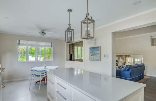 Douglas House | Capri Manor, Young Estates · Stunning Luxury Beachfront Villa