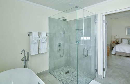 Douglas House | Capri Manor, Young Estates · Stunning Luxury Beachfront Villa