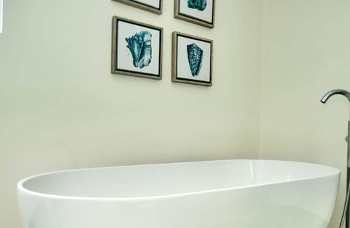 Douglas House | Capri Manor, Young Estates · Stunning Luxury Beachfront Villa