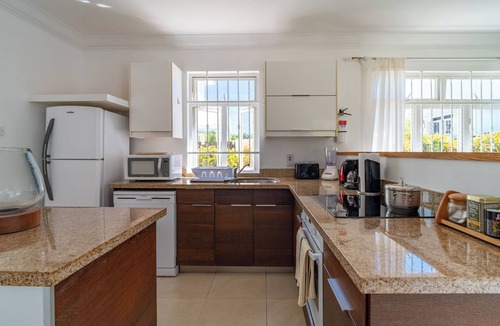 Enterprise Condo | Charming 2-bedroom Condo Near White Sandy Beaches and Surf Breaks