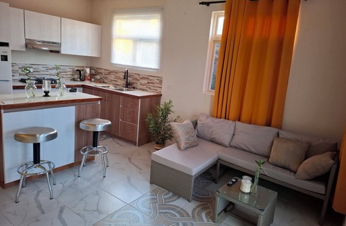 West Coast Apartment | Charming cozy 1-bedroom apartment in fabulous Cottage St. George with WiFi, AC