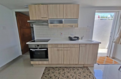 Oistins Apartment | Charming studio in quiet, adorable location in Christ Church with WiFi, AC & TV