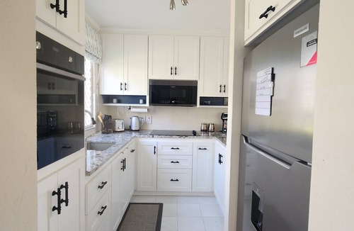Clapham House | Charming Villa at Rockley Golf & Country Club - Prime South Coast location.