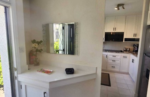 Clapham House | Charming Villa at Rockley Golf & Country Club - Prime South Coast location.