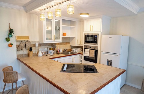 Sunset Crest Condo | Cozy Condo Near the Coast- Garden & Pool View Fast Wi-Fi