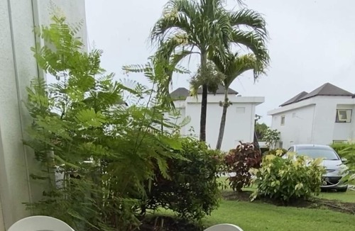 Blue Waters Apartment | Cozy Retreat Located At The Idyllic Rockley Golf Resort .