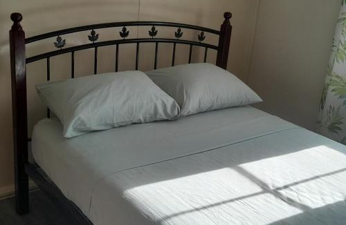 Haggatt Hall Apartment | CozyGetAway- US Embassy, MedPlus 10 mins away