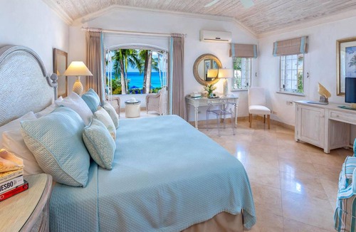 Gibbs Bay House | Emerald Beach Ixoria is part of a complex of six luxury beachfront villas