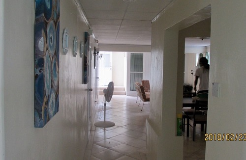 Brighton Apartment | Enjoy A Peaceful Vacation Steps away from a Pristine Beach On The West Coast.