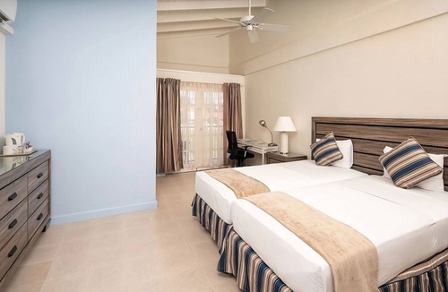 St. Lawrence Gap Hotel | Experience Soothing Moments & Luxury! 3 Units w/Balcony | Outdoor Pool