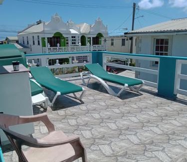 Charnocks Apartment | Michand Guest Apartments- Cozy one or two bedroom- 5 walk minutes from airport 10 mins drive to Oistins or beach