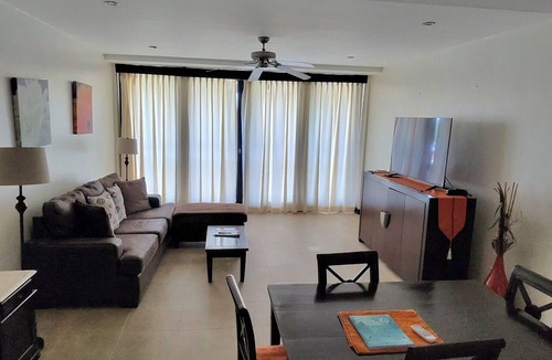 Marine Gardens Condo | Modern 1-bedroom condo ,180m from beach ,with pool , AC and gym access
