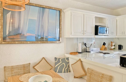 Rendezvous Apartment | Modern Apartment near Rockley Beach with Golf, Tennis, Pools & Onsite Restaurant