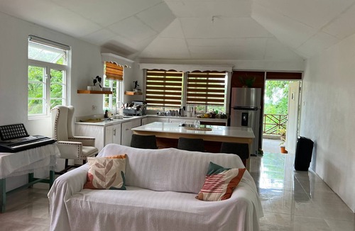 Saint Sylvans Cabin | Modern Eco lodge with A/C in bedrooms and 40ft patio for relaxation and fun.
