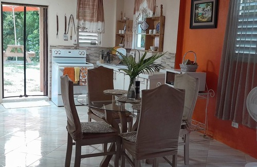 Saint Sylvans Cabin | Modern Eco lodge with A/C in bedrooms and 40ft patio for relaxation and fun.
