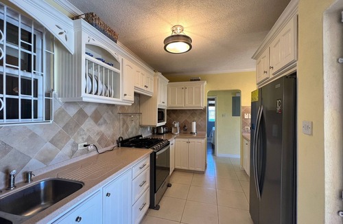 Oistins House | Modern Home Close to Beach, Oistins, Surfing. Secondary Rental on Premises.