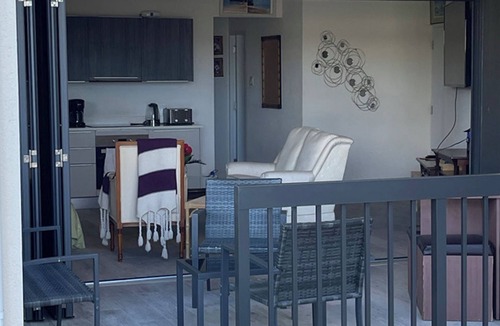 Fitts Village Apartment | Nestled in the heart of Fitts Village, Zinnia becons with the promise of a costa