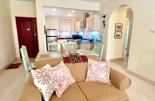 Callendar Condo | Nestled on the prestigious Barbados Golf Course, this charming two-bedroom called “Island Time”