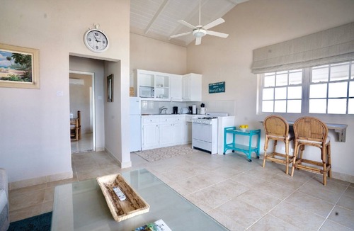 Green Garden Apartment | Ocean facing spacious One Bedroom Apt two minutes walk to the beach