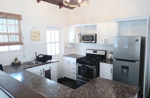 Scarborough Cottage | Oistins Cottage - Just Moments to the Beach + Pool Deck!